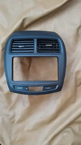 8002C057ZZ MITSUBISHI Sport Center Dash Radio Bezel Air Vents