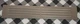 GM Part #15750385 : Rear scuff plate door sill garnish Tan