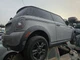 2010-2012 Mini Cooper R56 Seat Belt Tensioner Front Left Used OEM 72117211591