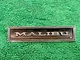 1970s Malibu Emblem for Interior Door Panel #7793368