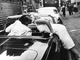 Marilyn Monroe leans over the door of a convertible Ford Thunderbi- Old Photo